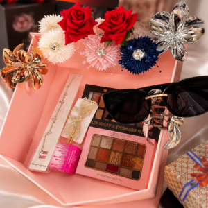 Feminine beauty gift arrangement on satin